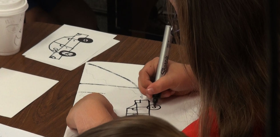 A student working on an illustration for her E-book A student working on an illustration for her E-book